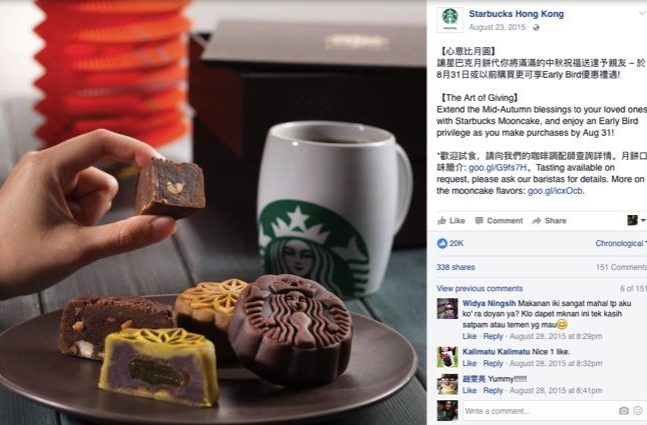 A person is holding up an award-winning cup of Starbucks coffee. A person is holding up an award-winning cup of Starbucks coffee.