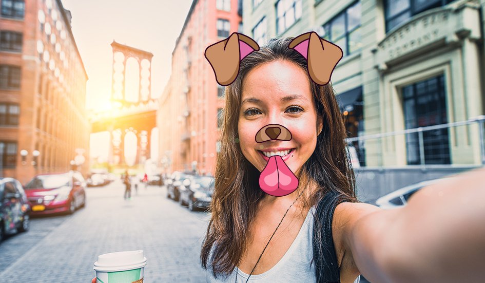 A woman is taking a selfie with a dog on her face in Hong Kong. A woman is taking a selfie with a dog on her face in Hong Kong.