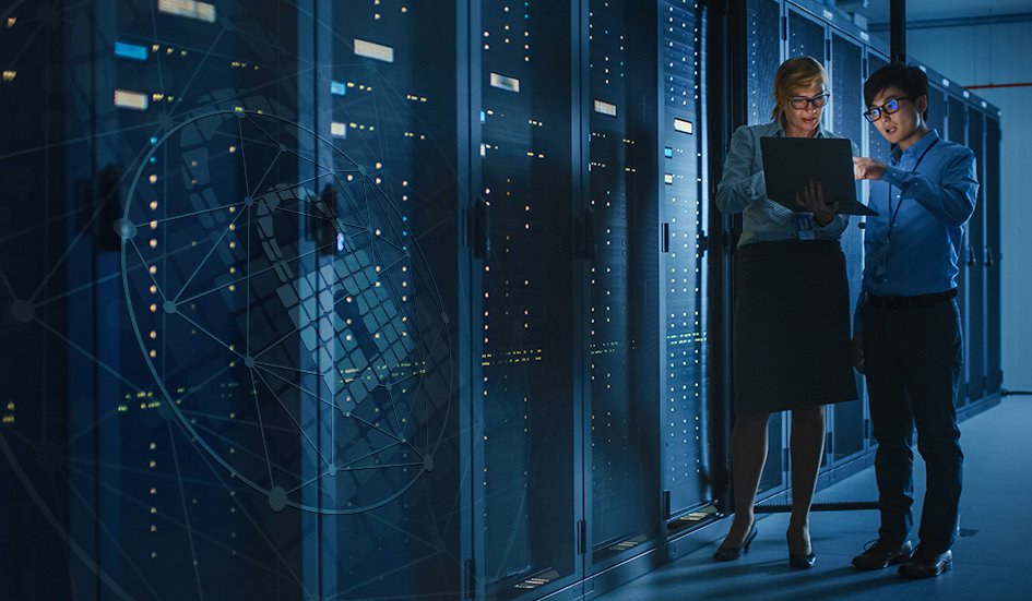 Two award-winning individuals standing in a server room located in Hong Kong. Two award-winning individuals standing in a server room located in Hong Kong.