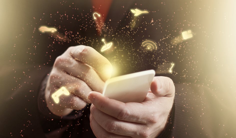 A man in a suit is holding an award winning smart phone. A man in a suit is holding an award winning smart phone.