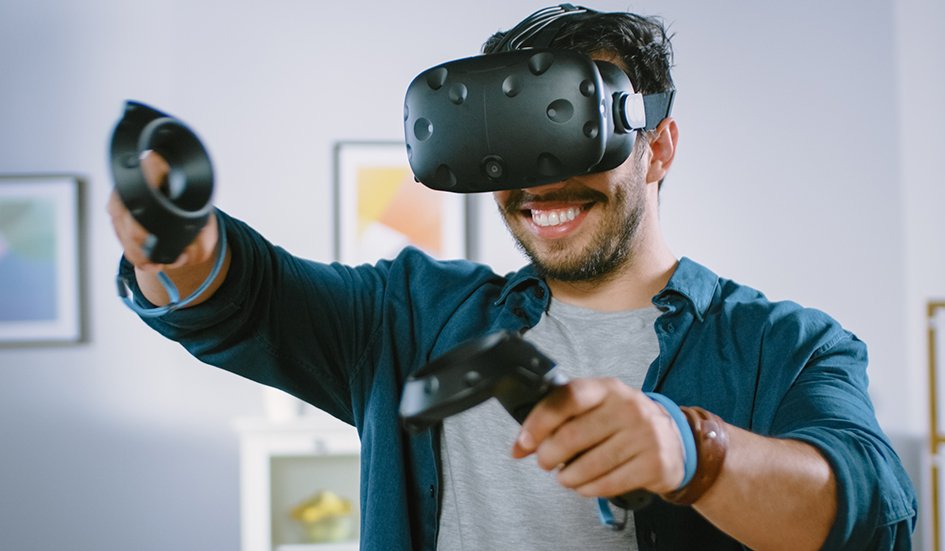 A man is playing an award-winning game using a VR headset in Hong Kong. A man is playing an award-winning game using a VR headset in Hong Kong.