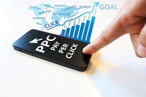 A hand in Hong Kong is pointing at a phone displaying the words pay per click, highlighting the significance of SEO and digital marketing. A hand in Hong Kong is pointing at a phone displaying the words pay per click, highlighting the significance of SEO and digital marketing.