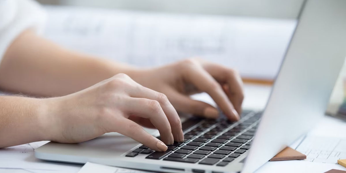typing typing on laptop