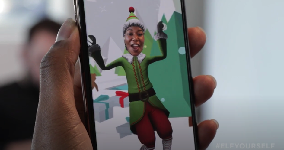 An SEO expert in Hong Kong proudly displays their award-winning Christmas elf mobile application on a phone. An SEO expert in Hong Kong proudly displays their award-winning Christmas elf mobile application on a phone.